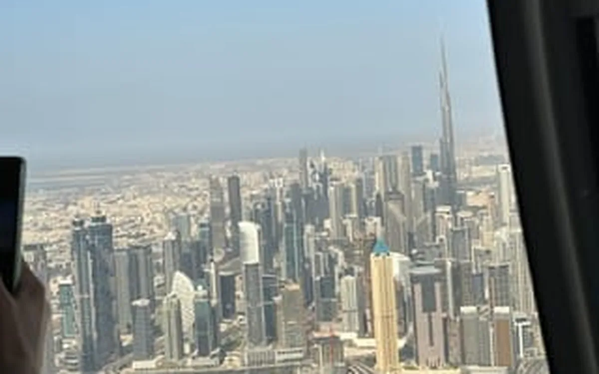 The Dubai skyline seen through a helicopter window